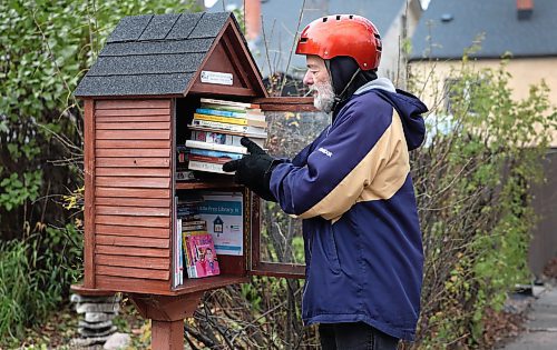 Ruth Bonneville / Free Press
ENT - Little Free Library
Photo of Tim Brandt dropping books off at a Little Free Library located at 510 St. John’s Ave. Tuesday.
For the past month, Tim Brandt has been cycling around Winnipeg to distribute his late brother's book collection to little free libraries across the city. Les Brandt died unexpectedly this summer and had roughly 2,000 books. Instead of donating or tossing the books, Tim decided to share them with the community in a meaningful way. “I think Les would be glad to know his books are traveling,” he says.
See story by Eva Wasney
Nov 4th, 2025