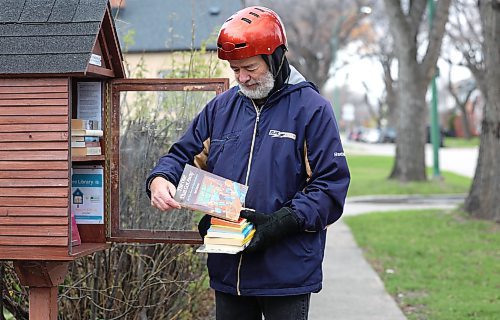 Ruth Bonneville / Free Press
ENT - Little Free Library
Photo of Tim Brandt dropping books off at a Little Free Library located at 510 St. John’s Ave. Tuesday.
For the past month, Tim Brandt has been cycling around Winnipeg to distribute his late brother's book collection to little free libraries across the city. Les Brandt died unexpectedly this summer and had roughly 2,000 books. Instead of donating or tossing the books, Tim decided to share them with the community in a meaningful way. “I think Les would be glad to know his books are traveling,” he says.
See story by Eva Wasney
Nov 4th, 2025