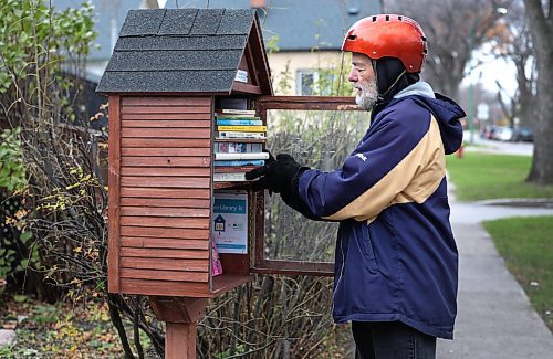 Ruth Bonneville / Free Press
ENT - Little Free Library
Photo of Tim Brandt dropping books off at a Little Free Library located at 510 St. John’s Ave. Tuesday.
For the past month, Tim Brandt has been cycling around Winnipeg to distribute his late brother's book collection to little free libraries across the city. Les Brandt died unexpectedly this summer and had roughly 2,000 books. Instead of donating or tossing the books, Tim decided to share them with the community in a meaningful way. “I think Les would be glad to know his books are traveling,” he says.
See story by Eva Wasney
Nov 4th, 2025