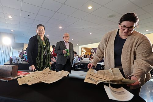 Organizers laid out artifacts of the 59 year old time capsule on a table for faculty and students to see. (Alex Lambert/The Brandon Sun)