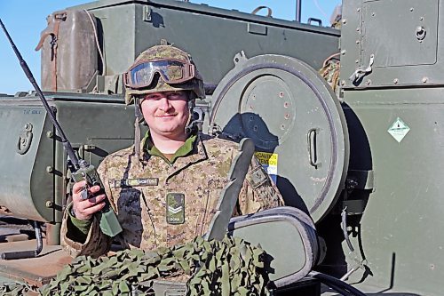Bombardier Michael St. Louis McIntosh pops out of the command post during a pause between artillery firing missions at CFB Shilo. (Connor McDowell/The Brandon Sun)