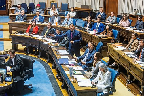 MIKE DEAL / FREE PRESS
Premier Wab Kinew speaks about the issue of harassment while NDP MLA’s listen including Nahanni Fontaine (foreground), Minister of Families of Manitoba enters the assembly chamber on the first day of the second session of the 43rd legislature, Wednesday afternoon.
Reporter: Maggie Macintosh
251001 - Wednesday, October 01, 2025.