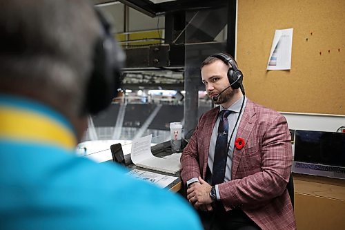 05112025
Rob Mahon, Media Relations and Broadcast Director for the Brandon Wheat Kings, in his studio booth above the ice at Assiniboine Credit Union Place during the pre-game show on Wednesday. 
(Tim Smith/The Brandon Sun)