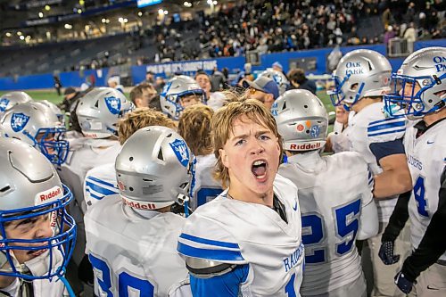 BROOK JONES/FREE PRESS
The Oak Park Raiders host the visiting Dakota Lancers in the ANAVETS Bowl at Princess Auto Stadium in Winnipeg, Man., Thursday, Nov. 6, 2025. The Raiders captured the ANAVETS Bowl after defeating the Lancers 22-17. Pictured: Oak Park defensive back Jack Redl (No. 11) celebrates the Raiders victory with his teammates.