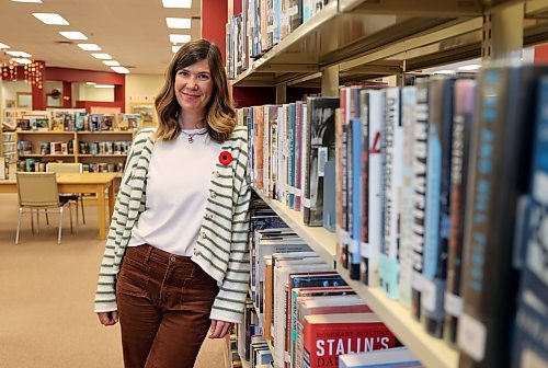 Erika Martin, Director of Library Services for the Western Manitoba Regional Library stands at the downtown Brandon location on Monday. (Alex Lambert/The Brandon Sun)