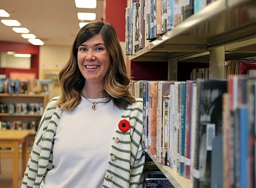 Erika Martin, director of library services for the Western Manitoba Regional Library, stands at the downtown Brandon location on Monday. (Alex Lambert/The Brandon Sun)