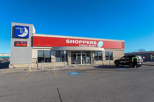 Mike Deal / Free Press
The Shoppers at 795 Keewatin Street is closed after an incident. Cleaners can be seen in hazmat suits wiping down the entrance area and disposing of cloths in garbage bags. A security guard posted outside the store had nothing to say. Police tape draped across the outside of the store. 
251112 - Wednesday, November 12, 2025. 