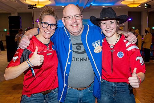 BROOK JONES/FREE PRESS
P.E.I. resident Jillian Sanderson, 22, who is originally from Calgary, Alta., is pictured with her mom Lisa Sanderson, 51, and her dad Ryan Sanderson, 53, while they are inside the Team Party Room - Eastern Social Hall at the Grey Cup Festival Hub at the RBC Convention Centre in Winnipeg, Man., Thursday, Nov. 13, 2025.