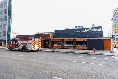 MIKE DEAL / FREE PRESS
According to CJOB police said WFPS trucks were called to La Roca, 155 Smith Street, around 6 a.m., where they found smashed windows and damage to the outside patio.
Police and fire crews were still on the scene as well as a construction crew cutting boards for the windows.
251114 - Friday, November 14, 2025.