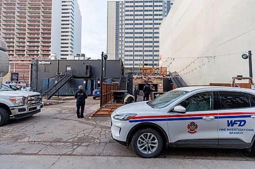 MIKE DEAL / FREE PRESS
According to CJOB police said WFPS trucks were called to La Roca, 155 Smith Street, around 6 a.m., where they found smashed windows and damage to the outside patio.
Police and fire crews were still on the scene as well as a construction crew cutting boards for the windows.
251114 - Friday, November 14, 2025.