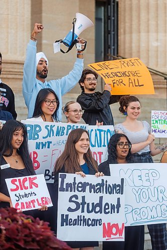 MIKE DEAL / FREE PRESS
The University of Manitoba Students’ Union held a rally at the Manitoba Legislative Building Wednesday afternoon calling on the provincial government to reinstate public healthcare coverage for international students in Manitoba.
Prabhnoor Singh, UMSU President (in light blue sweatshirt with mega phone) rallies the group gathered with a chant on the steps of the Legislative Building.
Cindy Lamoureux (centre front row), outgoing leader of the Manitoba Liberal Party was on hand to raise awareness for the healthcare coverage for international students.
Reporter: Maggie Macintosh
251001 - Wednesday, October 01, 2025.