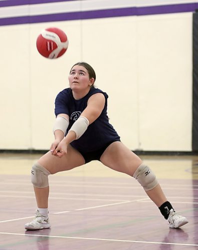 Reece Cowan passes a ball during Vincent Massey Vikings girls' volleyball practice on Wednesday. (Thomas Friesen/The Brandon Sun)
