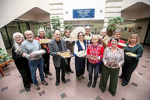 MIKAELA MACKENZIE / FREE PRESS
The holiday baking cookie swap group photo at the Free Press building on Tuesday, Nov. 18, 2025.
For Eva story.
Free Press 2025