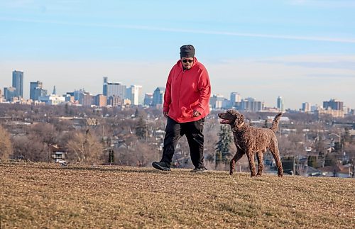 Ruth Bonneville / Free Press
Weather Standup - Dog walker on hill
Arlington Humphrey makes his usual daily walk along the top of Garbage Hill with his dog Choco, a five-year-old full standard poodle, on a warm November afternoon on Monday.
Nov 24th, 2025