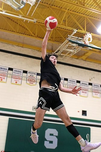 Clark Goran attacks a ball during Spartans practice on Monday. (Thomas Friesen/The Brandon Sun)