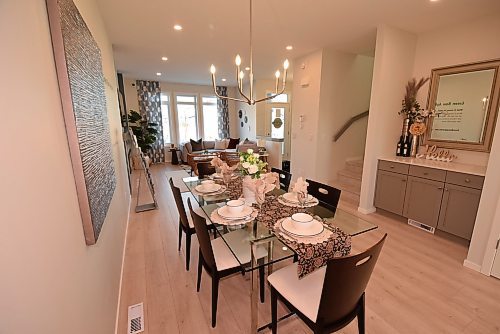 Todd Lewys / Free Press
The well-positioned and generous dining area is served by a handy dry bar/sideboard, and is just steps from the gorgeous great room.