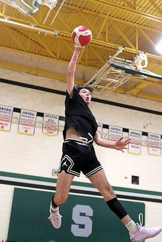 Clark Goran attacks a ball during Spartans practice on Monday. (Thomas Friesen/The Brandon Sun)