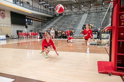 BROOK JONES/FREE PRESS
The Mennonite Brethren Hawks host the Jeanne-Sauv&#xe9; Olympiens in the Manitoba High Schools Athletic Association AAAA varsity girls volleyball semifinal. The Olympiens earned a 3-2 (23-25, 24-26, 25-23, 25-23, 15-7) victory over the Hawks. Pictured: Hawks outside-hitter Lily Molitwosky (No. 2) dives for the ball during third set action.