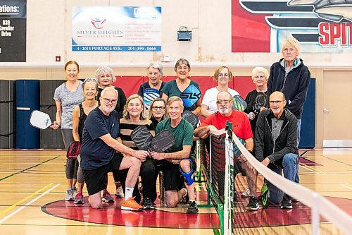 MIKAELA MACKENZIE / FREE PRESS

A seniors pickleball group, who are sponsors for Feed-A-Family, pose on the court at Sturgeon Heights Community Centre on Friday, Nov. 28, 2025. Top row, left to right: Lori Freeman, Kim Crawford, Debby Jablonski, Joan Brown, Pauline Macrodimitris, Donna Taylor, Eda Lebreton, Bill Armstrong Bottom row, left to right: Blaine Workman, Audrey Workman, Louise Murphy, Dale Crawford, Michael Taylor, Ross Robertson

For Josh story.
Free Press 2025