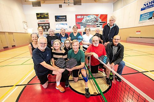 MIKAELA MACKENZIE / FREE PRESS

A seniors pickleball group, who are sponsors for Feed-A-Family, pose on the court at Sturgeon Heights Community Centre on Friday, Nov. 28, 2025. Top row, left to right: Kim Crawford, Lori Freeman, Debby Jablonski, Joan Brown, Pauline Macrodimitris, Donna Taylor, Eda Lebreton, Bill Armstrong Bottom row, left to right: Blaine Workman, Audrey Workman, Louise Murphy, Dale Crawford, Michael Taylor, Ross Robertson

For Josh story.
Free Press 2025