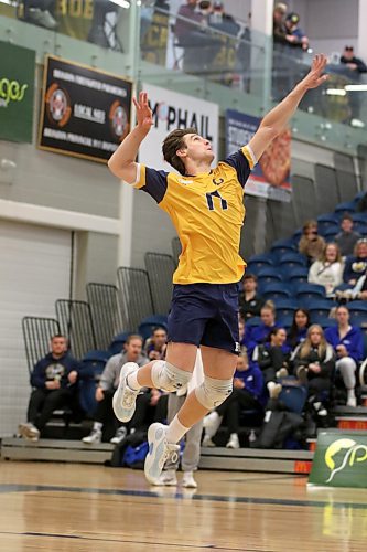 Brandon University's Liam Kindle serves against UBC Okanagan during their Canada West men's volleyball match at the HLC on Saturday. (Thomas Friesen/The Brandon Sun)