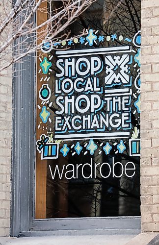 JOHN WOODS / WINNIPEG FREE PRESS
The Exchange District Biz annual “Shop Local, Shop The Exchange” campaign this month on store windows Monday, December 1, 2025. Rodney Francisco, co-owner of the Collab Shop, is participating in the program.

reporter: aaron