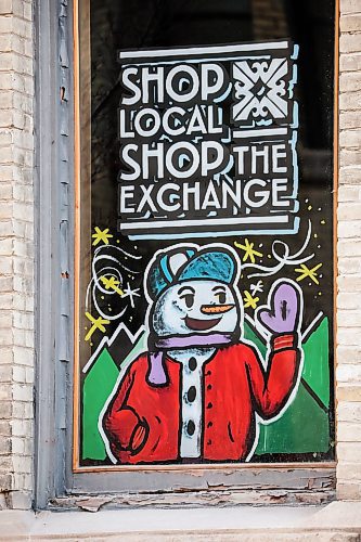 JOHN WOODS / WINNIPEG FREE PRESS
The Exchange District Biz annual “Shop Local, Shop The Exchange” campaign this month on store windows Monday, December 1, 2025. Rodney Francisco, co-owner of the Collab Shop, is participating in the program.

reporter: aaron