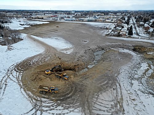 Construction work is done on a stormwater pond in Brandon’s south end, east of the Brandon Municipal Cemetery, on Friday. The pond, part of the larger southeast drainage project, is being built to combat flooding issues on Sycamore Drive and 18th Street. (Tim Smith/The Brandon Sun)