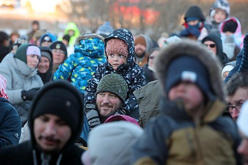 05122025
Bundled up visitors take in the entertainment during the CPKC Holiday Train stop in Minnedosa at sunset on Friday. The train also made stops in Portage la Prairie, Neepawa and Shoal Lake on Friday. The annual  CPKC Holiday Train raises money and food to support local food banks throughout its journey. 
(Tim Smith/The Brandon Sun)