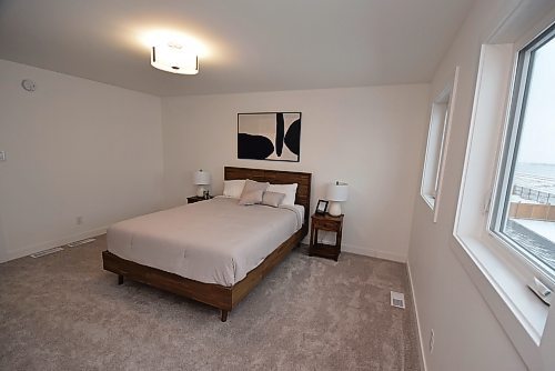 Todd Lewys / Free Press
Tucked well away from the two secondary bedrooms, the primary bedroom is a private, naturally bright oasis.