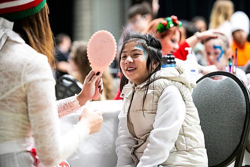 MIKAELA MACKENZIE / FREE PRESS

Grade one Elwick Community School student Jade Chieu is delighted by her face painting at the Winter Wonderland party for children from under-resourced areas, put on by Variety Manitoba, at the RBC Convention Centre on Tuesday, Dec. 9, 2025.

Standup.
Free Press 2025