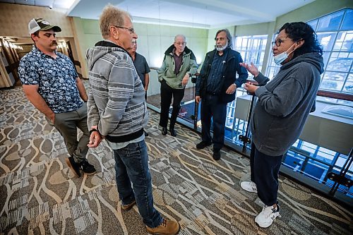 JOHN WOODS / FREE PRESS
Bev Smith from Brokenhead, right, talks to other concerned councillors and citizens outside a SIO Silica Sands Project community open house with Brokenhead residents at Club Regent Hotel Monday, July 7, 2025. SIO were presenting further information but non-residents were no allowed to participate.
Reporter: matt
