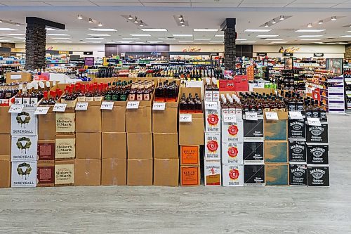 MIKE DEAL / FREE PRESS
Liquor store employees put the final touches on the display of American liqour that will be going on sale at the Crestview MLCC Wednesday morning.
Reporter: Scott Billeck
251210 - Wednesday, December 10, 2025.