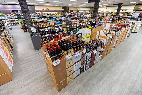 MIKE DEAL / FREE PRESS
Liquor store employees put the final touches on the display of American liqour that will be going on sale at the Crestview MLCC Wednesday morning.
Reporter: Scott Billeck
251210 - Wednesday, December 10, 2025.