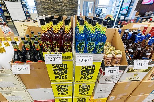 MIKE DEAL / FREE PRESS
Liquor store employees put the final touches on the display of American liqour that will be going on sale at the Crestview MLCC Wednesday morning.
Reporter: Scott Billeck
251210 - Wednesday, December 10, 2025.