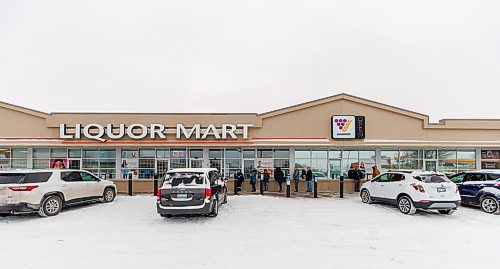 MIKE DEAL / FREE PRESS
Customers line up around 9:30am waiting for the store opening at 10am to pick up some American liquor.
Liquor store employees put the final touches on the display of American liqour that will be going on sale at the Crestview MLCC Wednesday morning.
Reporter: Scott Billeck
251210 - Wednesday, December 10, 2025.