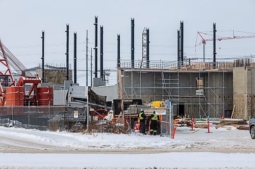 MIKE DEAL / FREE PRESS
A large dump truck lies on its side in the construction yard of the old Capri Motel Thursday morning.
A person was seen being taken away in an ambulance.
251211 - Thursday, December 11, 2025.