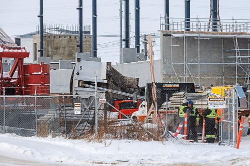 MIKE DEAL / FREE PRESS
A large dump truck lies on its side in the construction yard of the old Capri Motel Thursday morning.
A person was seen being taken away in an ambulance.
251211 - Thursday, December 11, 2025.