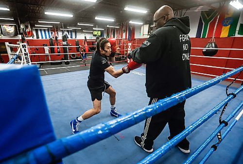JOHN WOODS / WINNIPEG FREE PRESS
Isaiah Rock trains with coach Jerome Peters at Powers Boxing Club Monday, December 15, 2025. Rock won gold at the nationals and will be boxing in Spain at a major event.
reporter: taylor