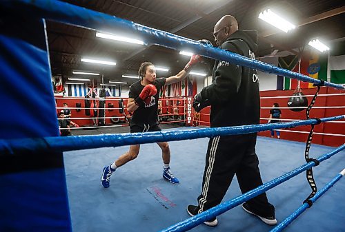 JOHN WOODS / WINNIPEG FREE PRESS
Isaiah Rock trains with coach Jerome Peters at Powers Boxing Club Monday, December 15, 2025. Rock won gold at the nationals and will be boxing in Spain at a major event.
reporter: taylor