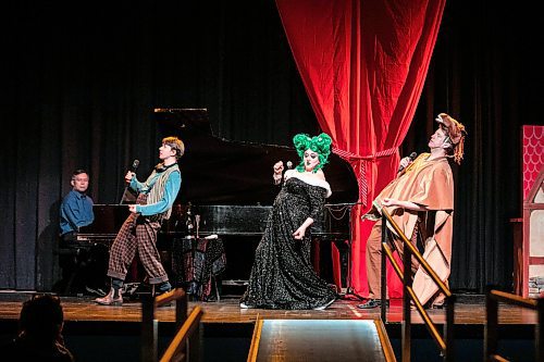 MIKAELA MACKENZIE / FREE PRESS

Cyan Gargo (Jax, left), Theresa Thomson (the dame) and Christopher Dunn (the pony) perform a scene of the Merry Crip-mas Panto at the West End Cultural Centre on Wednesday, Dec. 17, 2025. 

For Ben story.
Free Press 2025