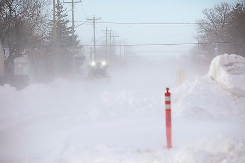 MIKAELA MACKENZIE / FREE PRESS
A plow drives down Silver Avenue, west of Ferry Road, as snow blows across the streets on Thursday, Dec. 18, 2025.
Free Press 2025