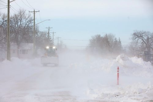 MIKAELA MACKENZIE / FREE PRESS
A plow drives down Silver Avenue, west of Ferry Road, as snow blows across the streets on Thursday, Dec. 18, 2025.
Free Press 2025