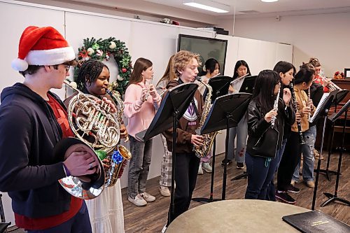 17122025
Students with the Vincent Massey High School Band perform Christmas classics for residents at Hillcrest Personal Care Home in Brandon on Wednesday morning. They also performed for residents of Riverheights Terrace later in the afternoon. (Tim Smith/The Brandon Sun)
