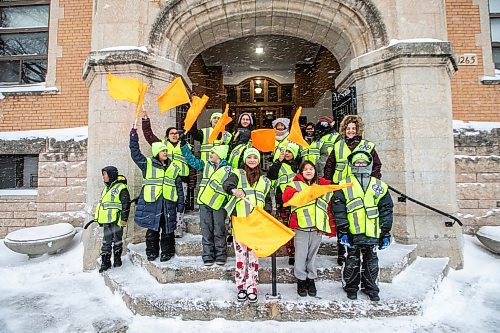 MIKAELA MACKENZIE / FREE PRESS

School patrols pose for a group photo at Isaac Brock School on Friday, Dec. 19, 2025. 

For Maggie story.
Free Press 2025