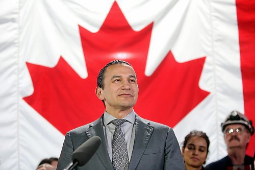 Manitoba Premier Wab Kinew pauses during an announcement of more than $150 million in supports for Manitoba producers, including $10 million to match federal AgriStability funding. The premier made the announcement at the Maple Leaf Foods plant in Brandon in the facility's cafeteria. (Matt Goerzen/The Brandon Sun)