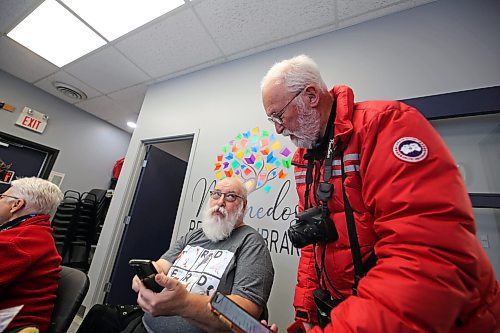 Duane Diehl (left) and Buzz Crowston discuss their bird count and species found at lunch in the Minnedosa Regional Library. The two spent the morning counting birds, with the help of apps that assist in identifying the animal and tracking the total seen. (Connor McDowell/The Brandon Sun)