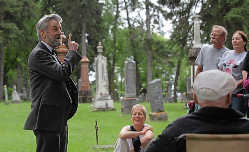 Chris Macdonald tells the life story of Beecham Trotter during a Gossip in the Graveyard tour at the Brandon Municipal Cemetery. (The Brandon Sun files)