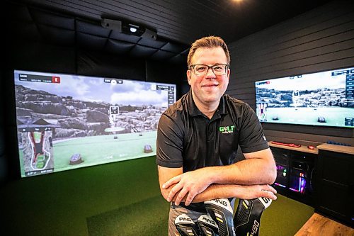 MIKAELA MACKENZIE / FREE PRESS

Lucas Mlinar, founder of Golf Haven (a new business that builds golf simulator sheds and does commercial golf simulator installations), in an example build on Wednesday, Dec. 31, 2025.

For Aaron story.
Free Press 2025