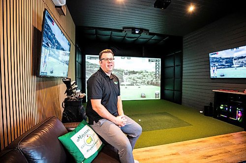 MIKAELA MACKENZIE / FREE PRESS
Lucas Mlinar, founder of Golf Haven (a new business that builds golf simulator sheds and does commercial golf simulator installations), in an example build on Wednesday, Dec. 31, 2025.
For Aaron story.
Free Press 2025